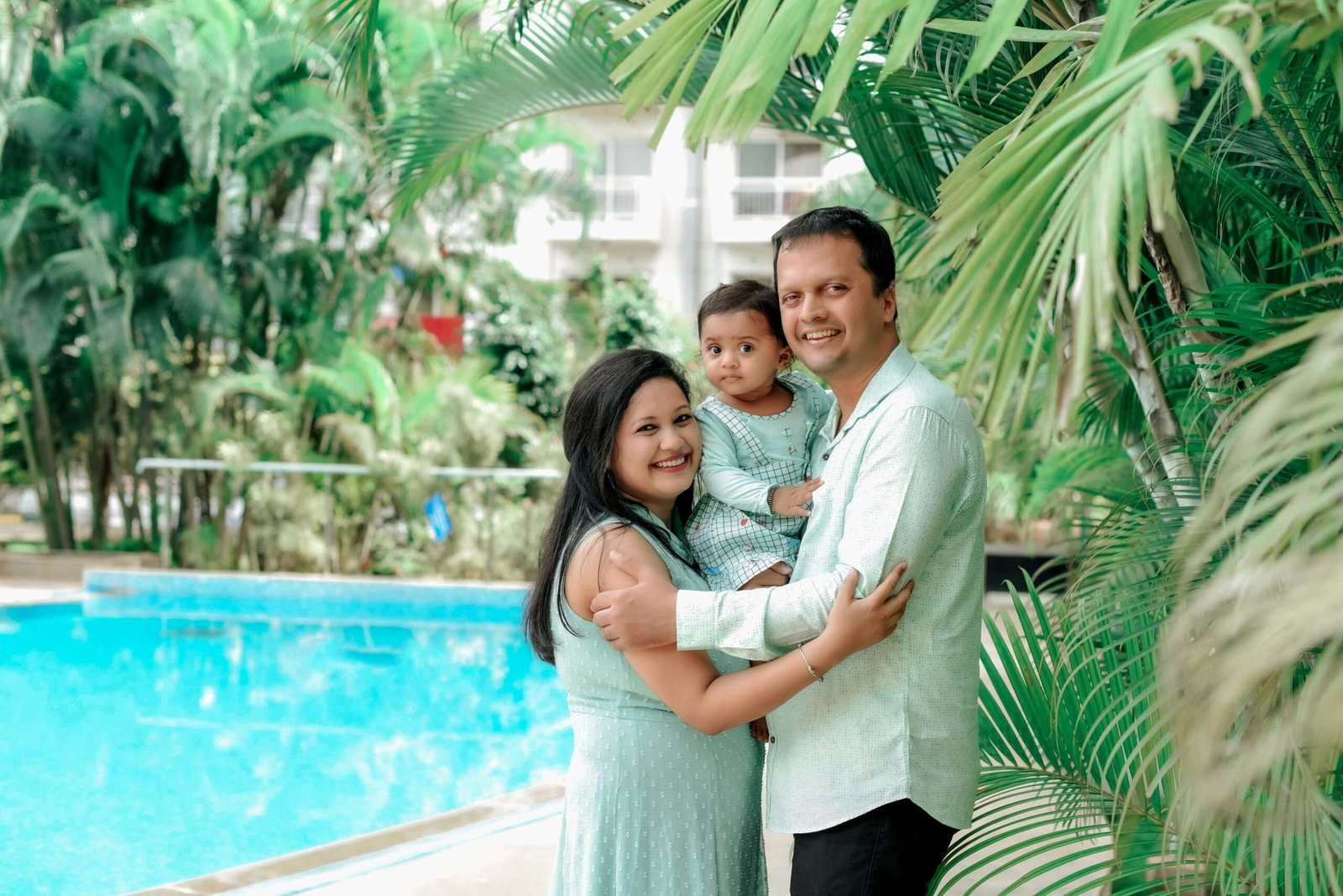 Maternity portrait in a flowing ivory gown, Bengaluru studio